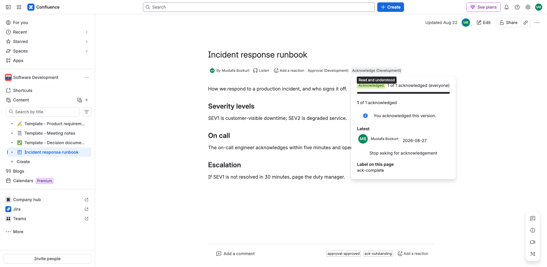 The acknowledgement panel on a Confluence page: who has signed, and the button every employee uses.